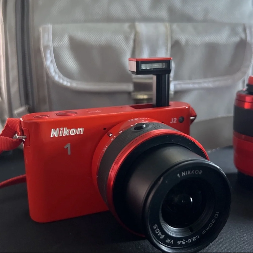 Nikon 1 J2 10.1 MP HD Digital Camera Bundle (Orange)